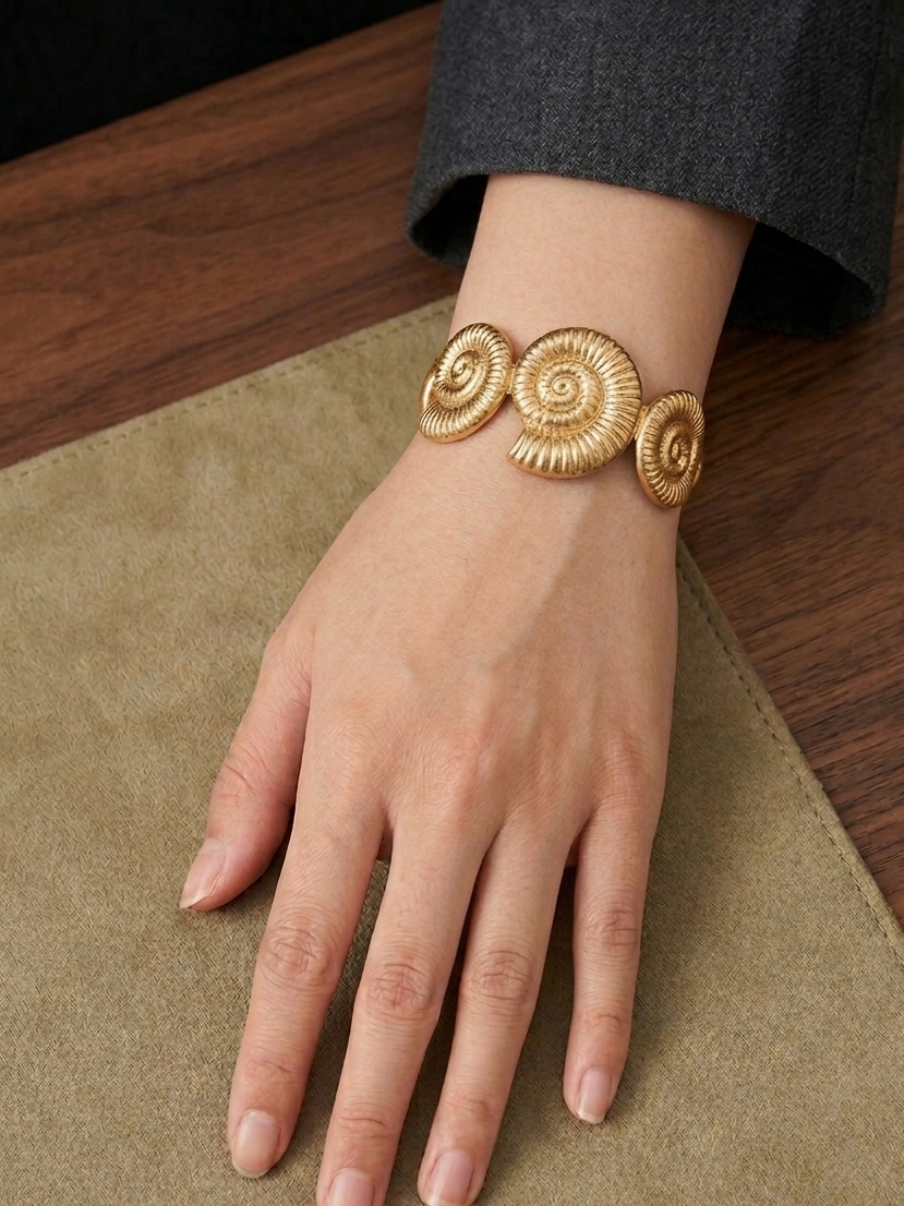 Gold Spiral Statement Bracelet – Artistic Bold Elegance