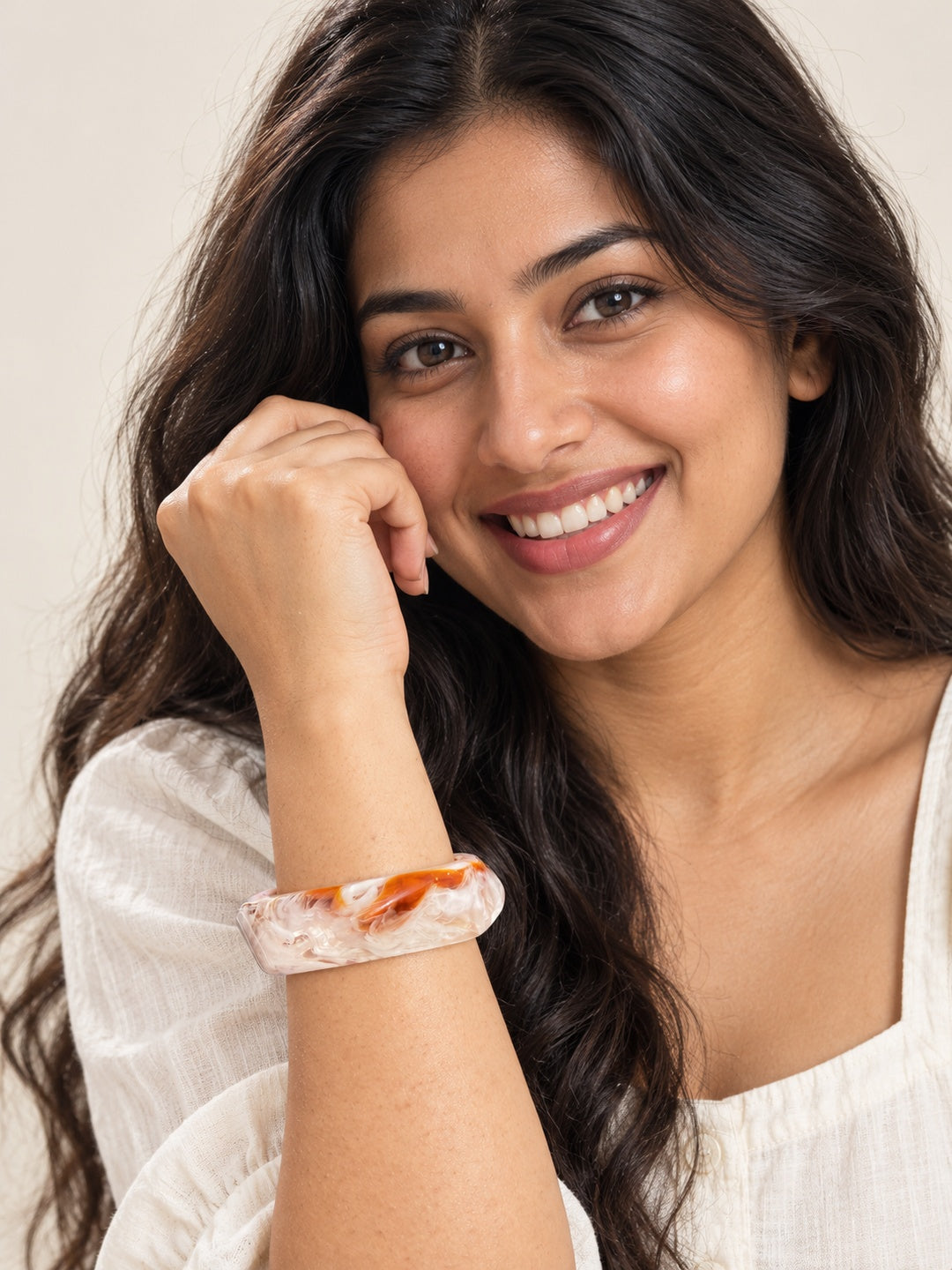 ELVION White Amber Marbled Bangle — Model wearing product