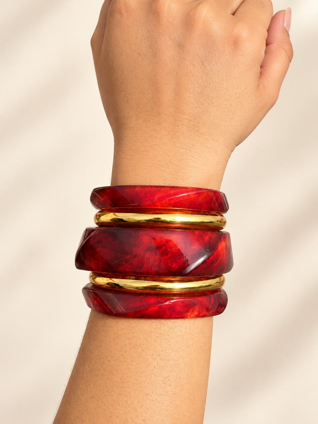 ELVION Red Gold-Tone Bangle Set — Close-up detail