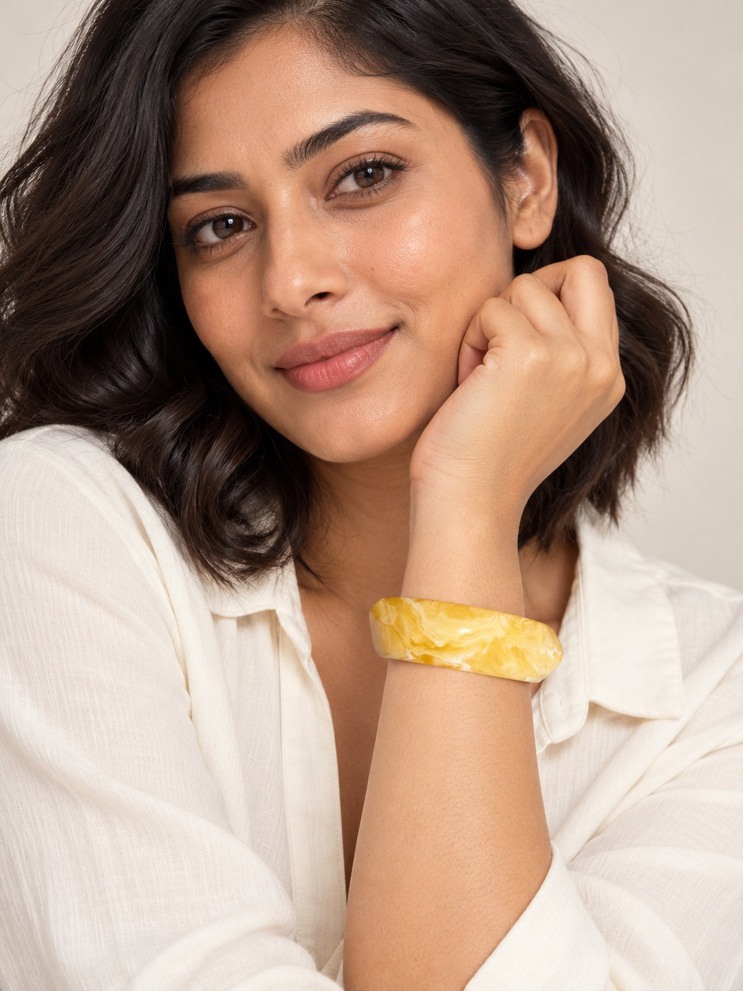 ELVION Yellow Marbled Bangle — Model wearing product