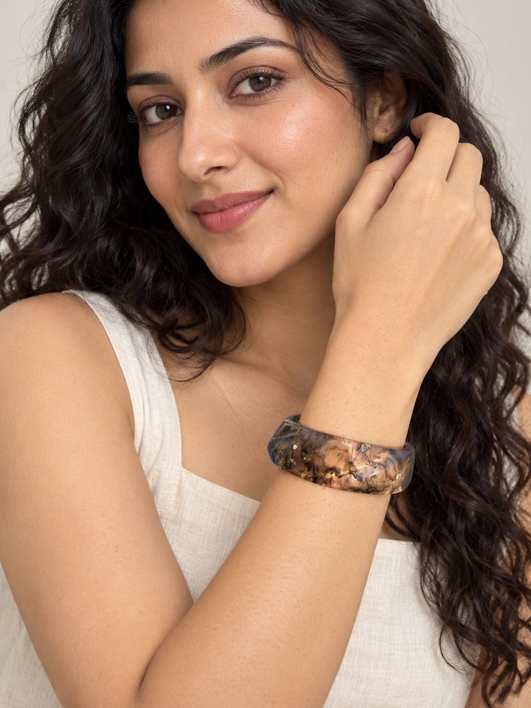 ELVION Smoky Gold-Flecked Bangle — Model wearing product