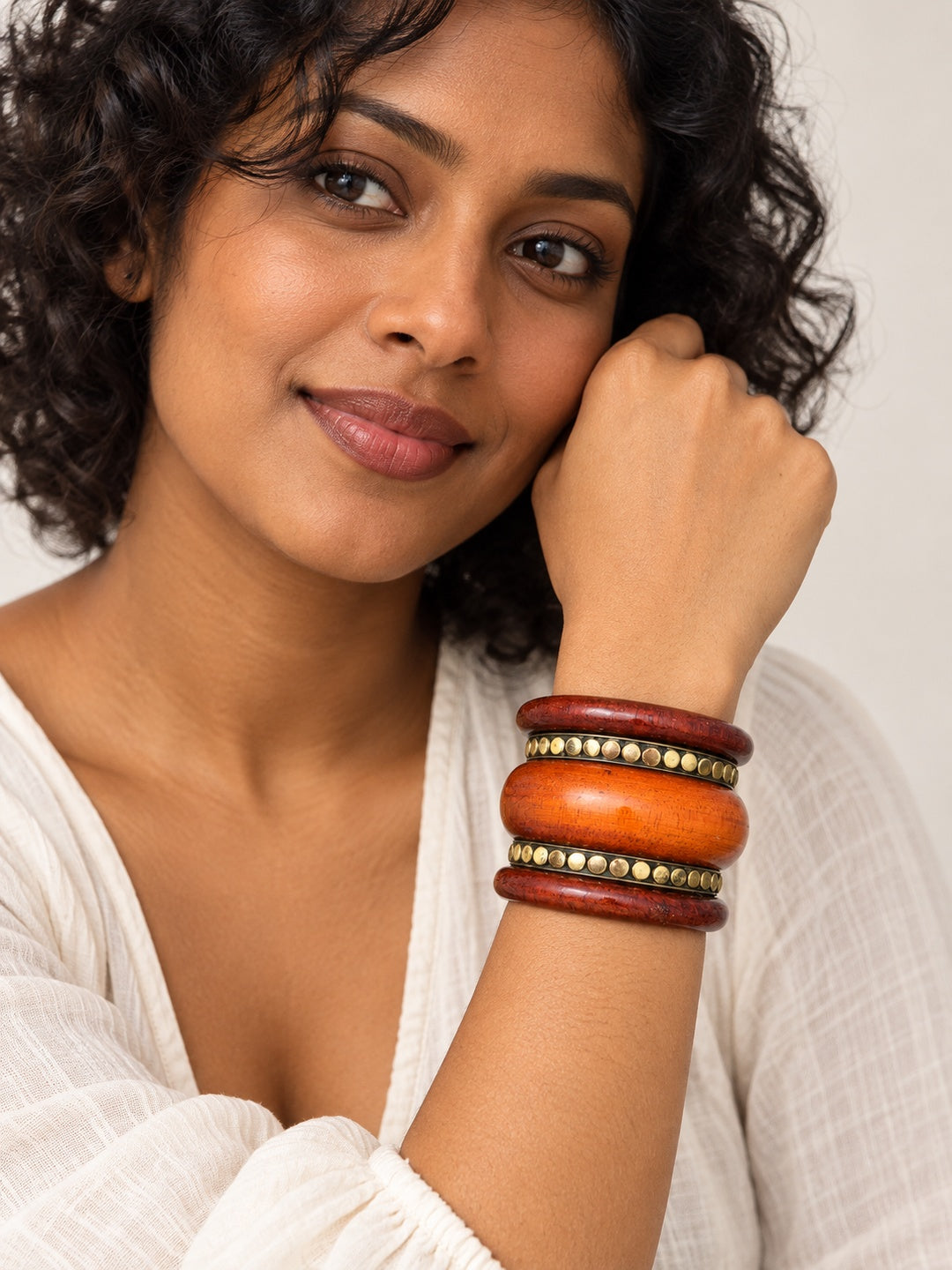 ELVION Brown Studded Bangle Set — Model wearing product