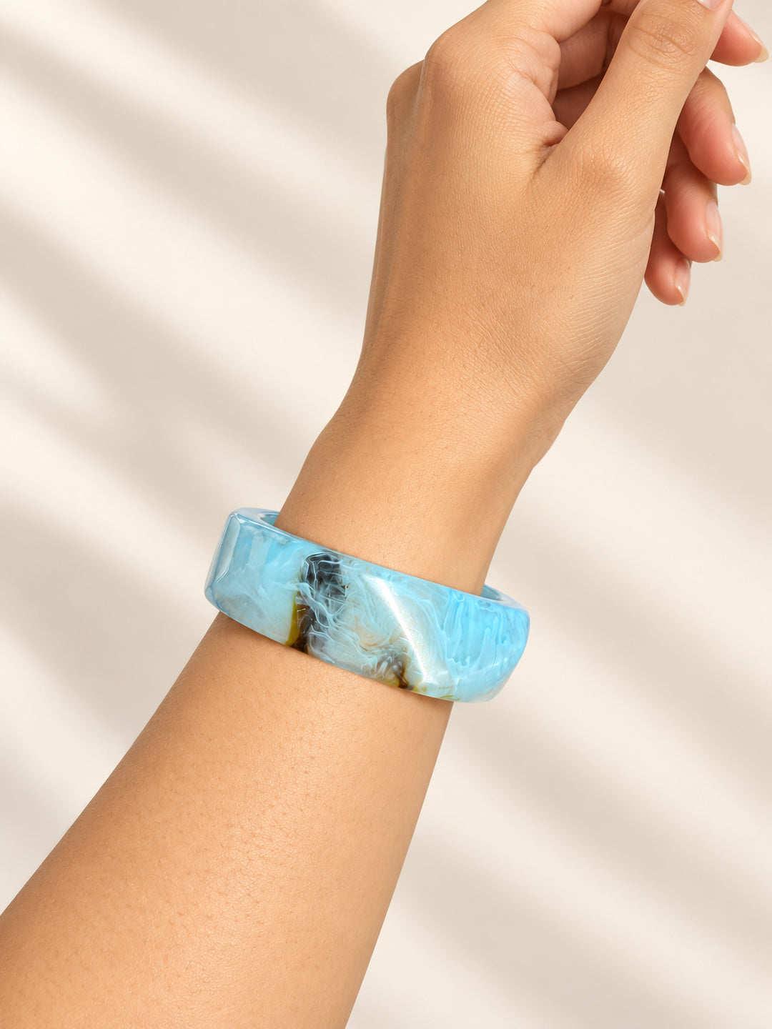 ELVION Blue Amber Marbled Bangle — Close-up detail