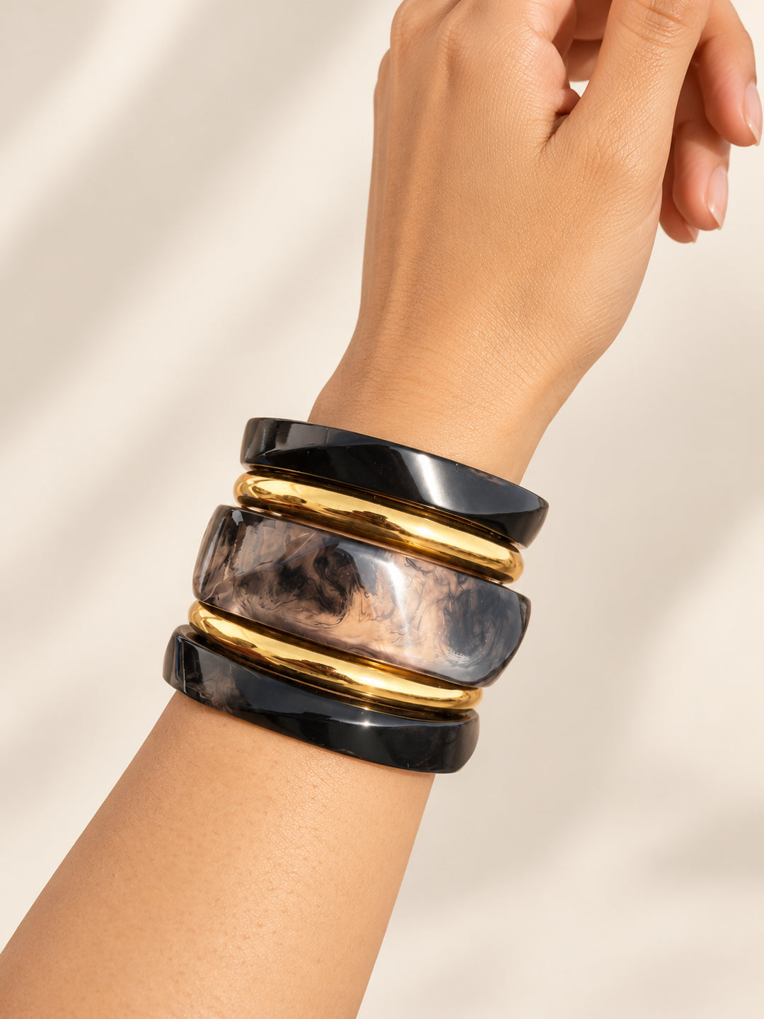 ELVION Black Gold-Tone Bangle Set — Close-up detail