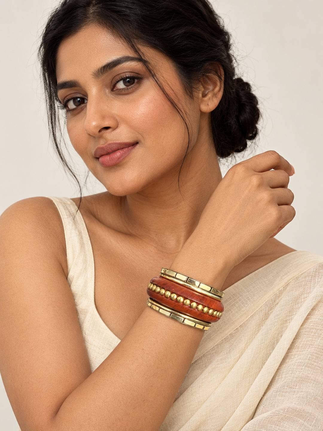 ELVION Brown Studded Bangle Set — Model wearing product