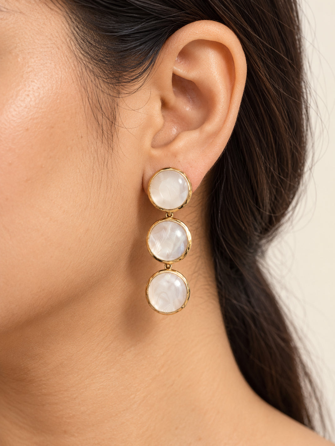 ELVION White Triple Disc Earrings — Close-up detail