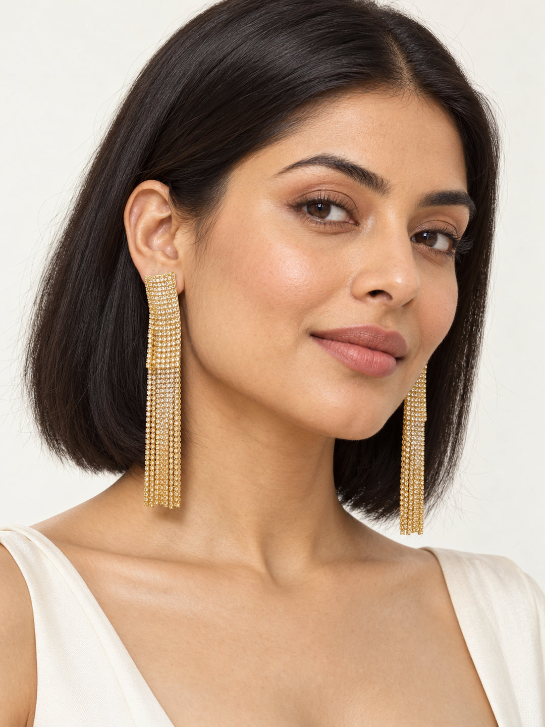 ELVION Gold Long Tassel Earrings — Model wearing product
