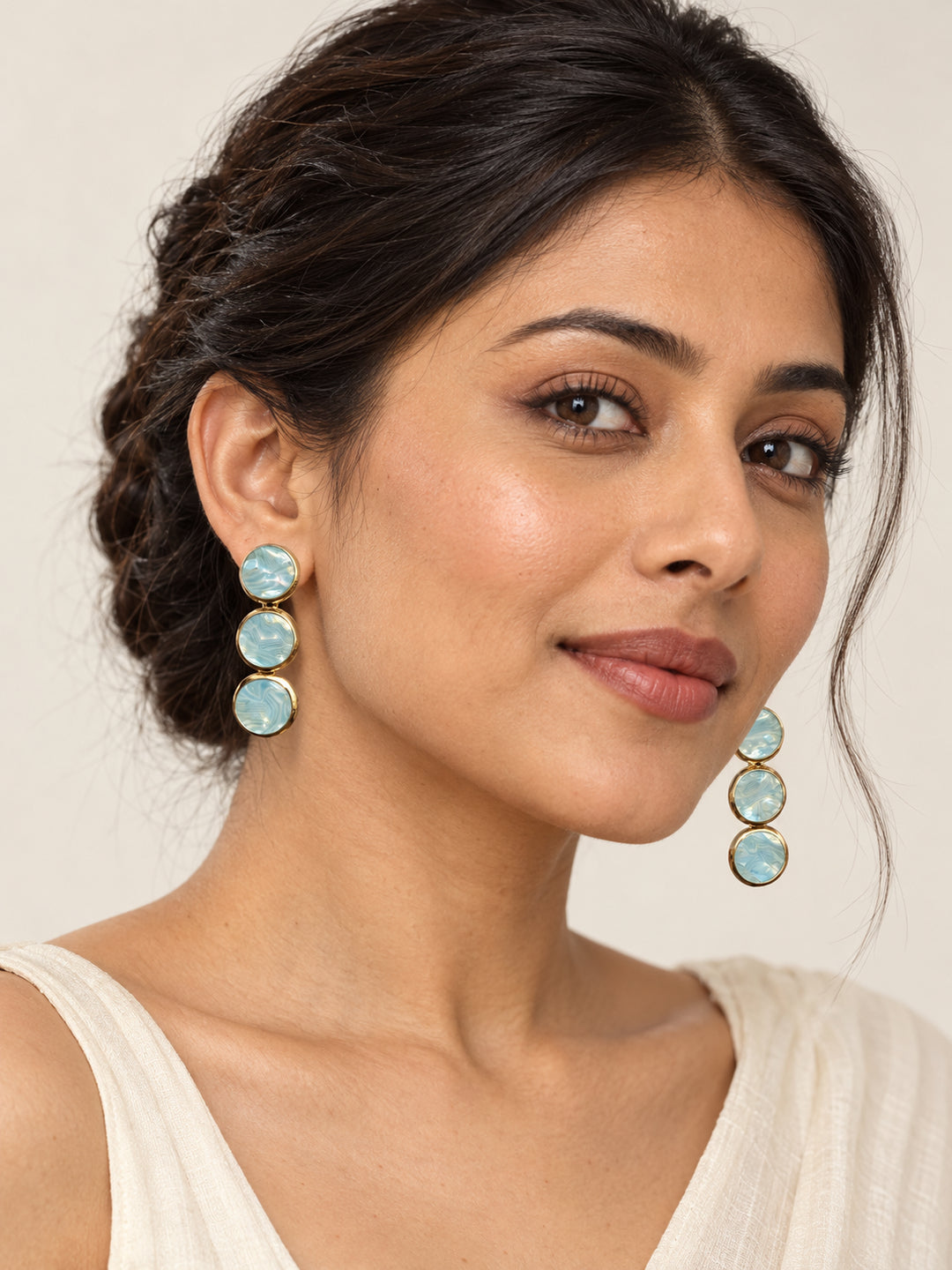 ELVION Blue Triple Disc Earrings — Model wearing product