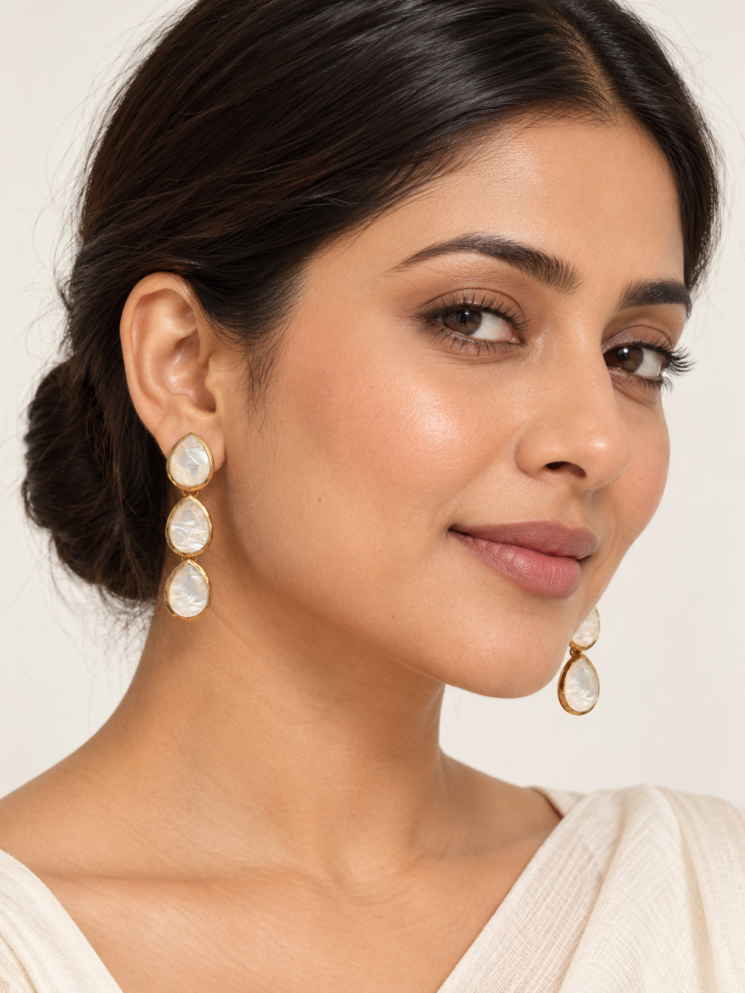 ELVION White Teardrop Drop Earrings — Model wearing product