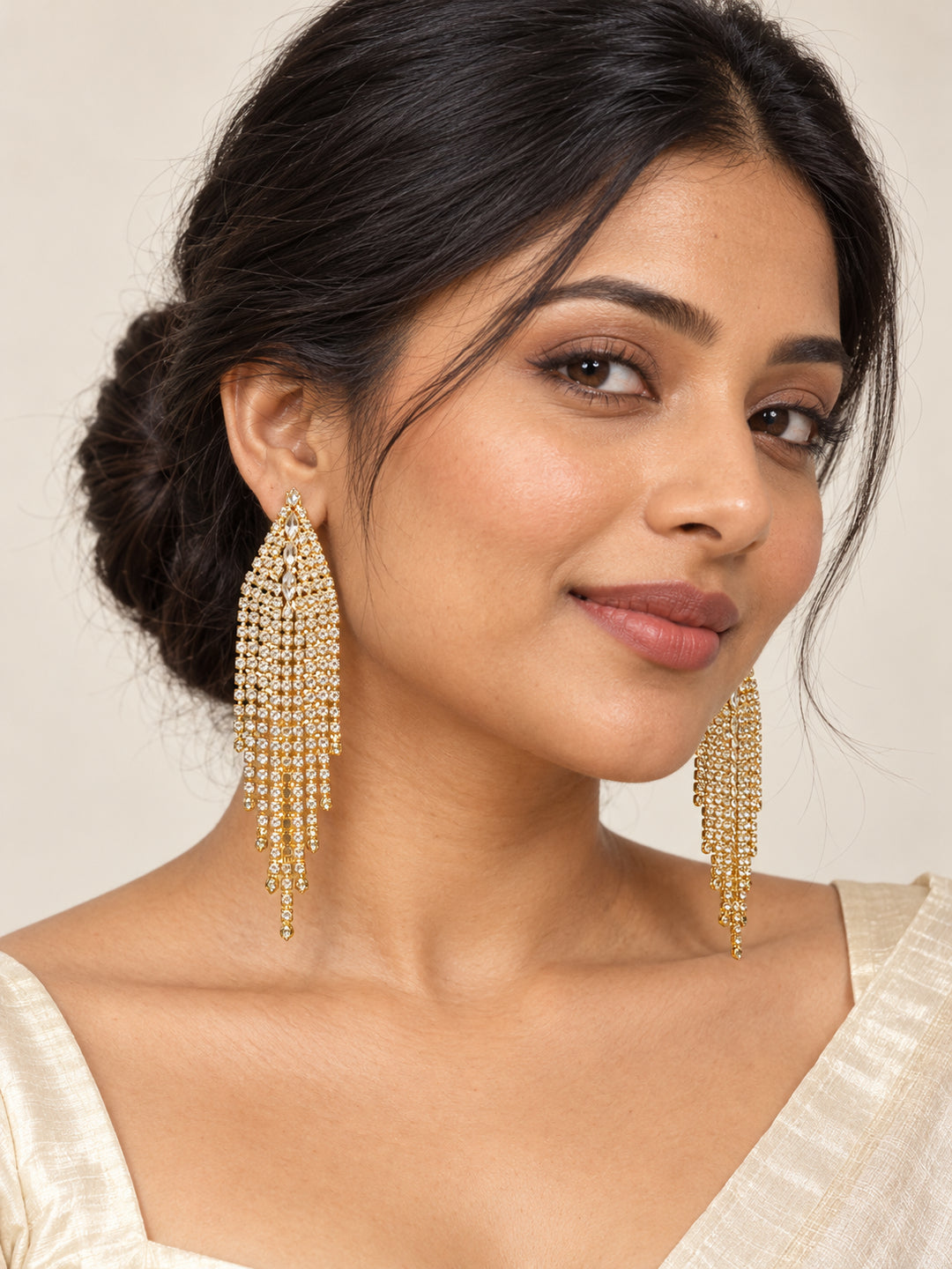 ELVION Gold Leaf Fringe Earrings — Model wearing product