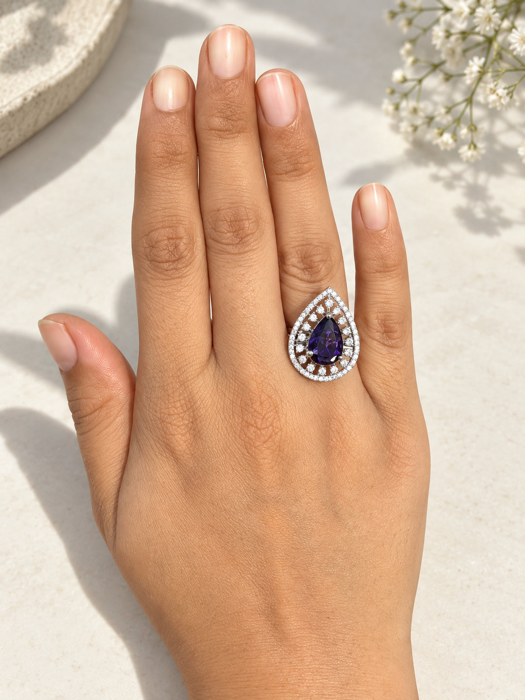 ELVION Purple Open Halo Pear Ring — Close-up detail