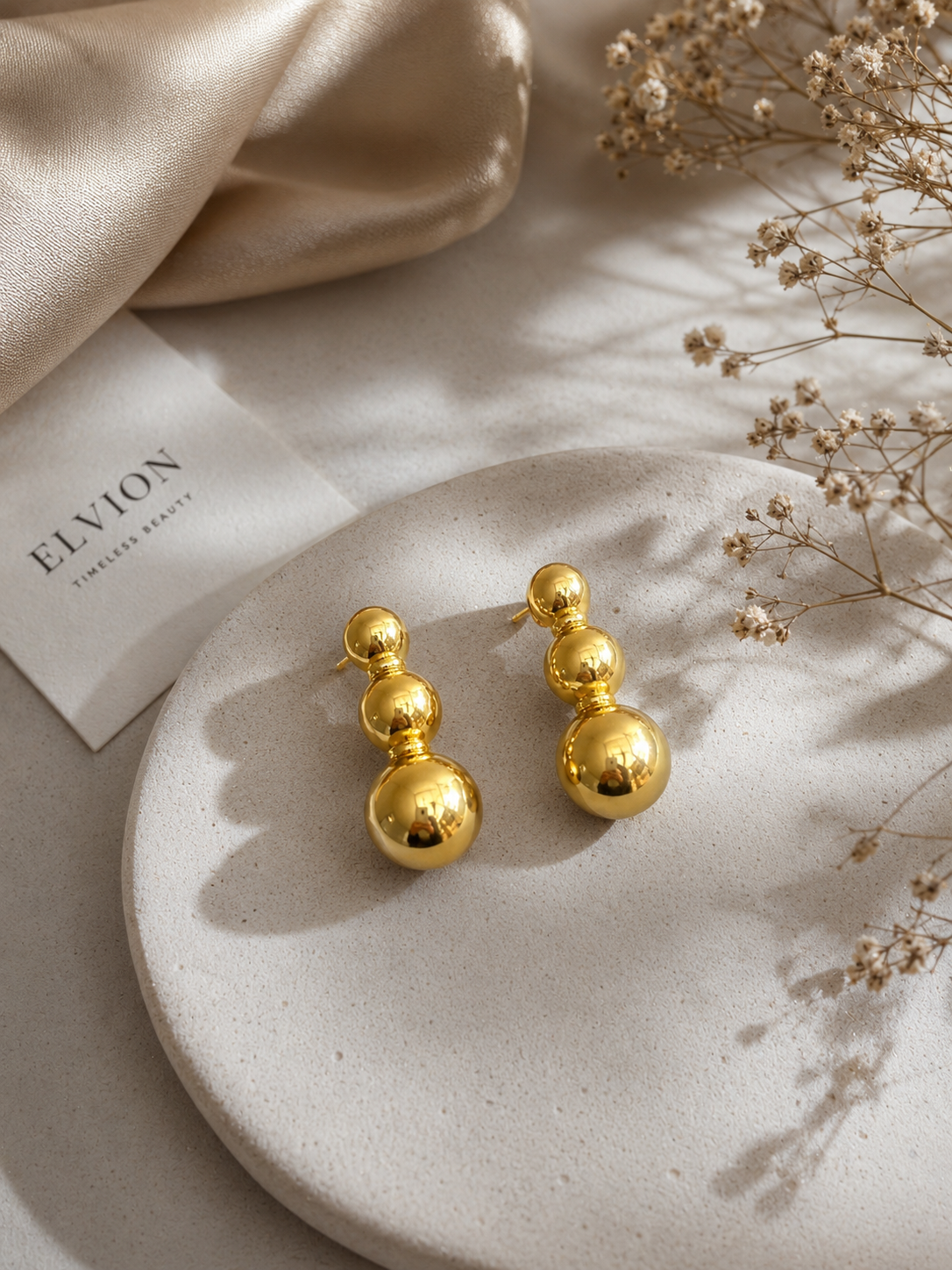 Elegant Triple Ball Glossy Gold Drop Earrings